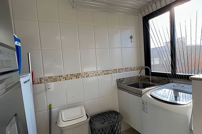 Pé na areia em Peracanga