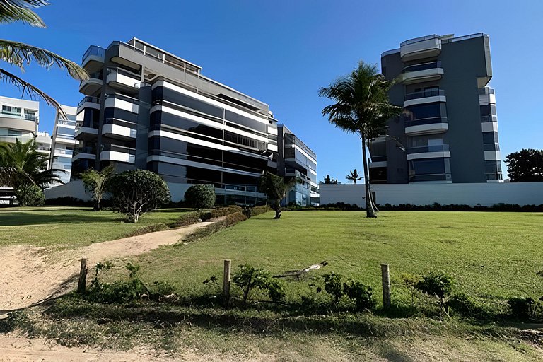 Pé na areia em Peracanga