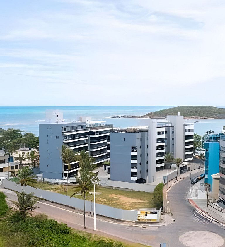 Pé na areia em Peracanga