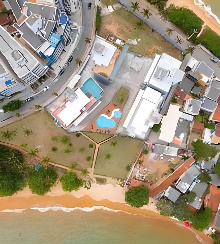 Pé na areia em Peracanga